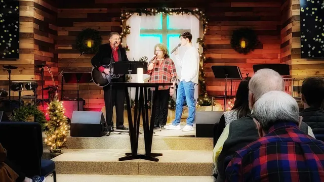 A family singing in worship
